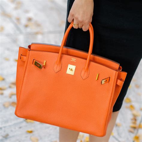 black and orange hermes bag|hermes orange pouch.